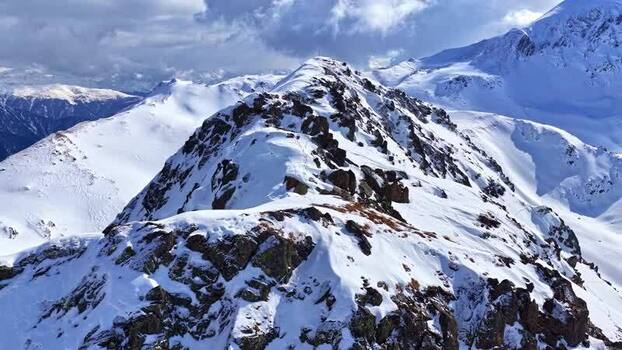 Aerial view of snowy mountain peaks in Nauders Austria.
