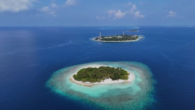 Aerial view of tropical islands with white sand and coral reefs Maldives. Aerial view of tropical islands with white sand and coral reefs Maldives.