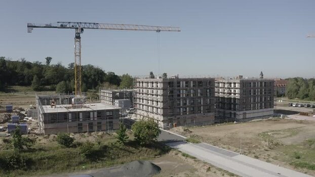 Aerial view of construction site with crane and buildings Germany.