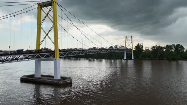 Aerial view of Jembatan Barito suspension bridge in Indonesia.