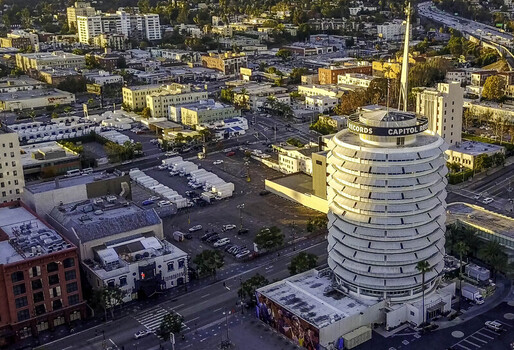 Hollywood California United States 22 September 2026 Aerial view of the iconic Capitol Records Building featuring its distinctive circular architecture urban streets and golden hour light. Hollywood California United States 22 September 2026 Aerial view of the iconic Capitol Records Building featuring its distinctive circular architecture urban streets and golden hour light.