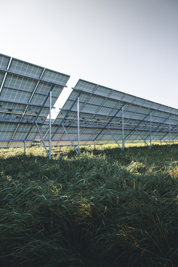 View of solar panels installed in a grassy field in Tartu County Estonia. View of solar panels installed in a grassy field in Tartu County Estonia.