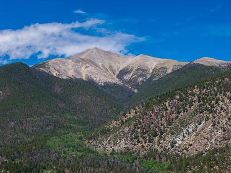 Aerial view of Mount Antero with rocky slopes and dense evergreen forests in Nathrop Colorado United States. Aerial view of Mount Antero with rocky slopes and dense evergreen forests in Nathrop Colorado United States.
