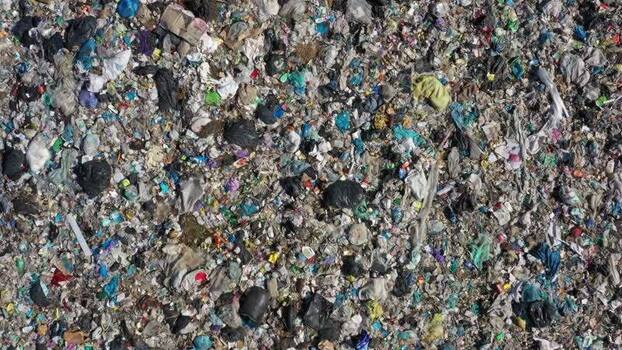 Aerial view of massive landfill site with plastic waste Russia.