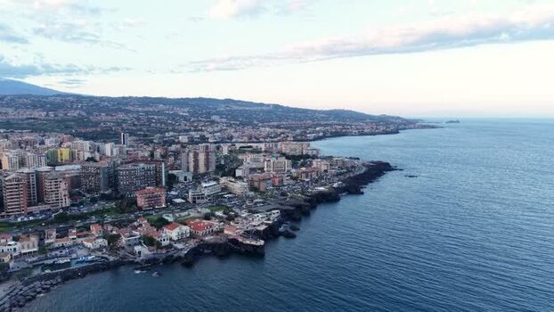 Aerial view of the coastal skyline and sea in Catania Italy. Aerial view of the coastal skyline and sea in Catania Italy.