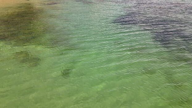 Aerial view of clear turquoise water and sandy seabed Portugal. Aerial view of clear turquoise water and sandy seabed Portugal.