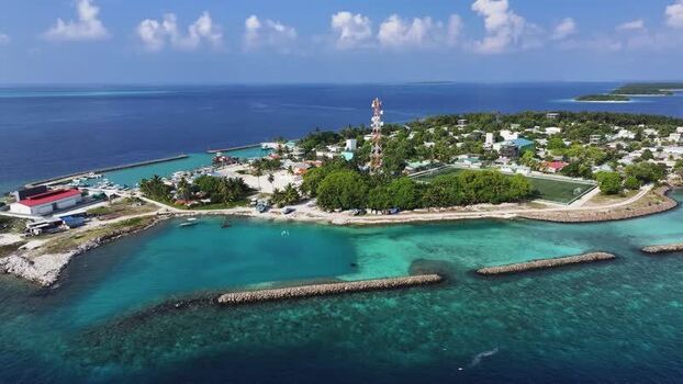 Aerial view of Kendhoo island with turquoise water Maldives. Aerial view of Kendhoo island with turquoise water Maldives.