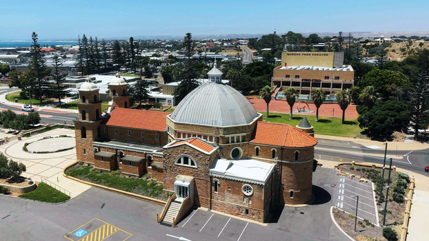 Aerial view of St Francis Xavier s Cathedral featuring its iconic dome and terracotta roof tiles situated near Queens Park Theatre in Geraldton Western Australia Australia. Aerial view of St Francis Xavier s Cathedral featuring its iconic dome and terracotta roof tiles situated near Queens Park Theatre in Geraldton Western Australia Australia.