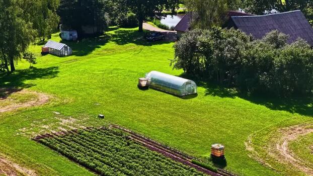 Aerial view of rural landscape with greenhouses in Latvia. Aerial view of rural landscape with greenhouses in Latvia.