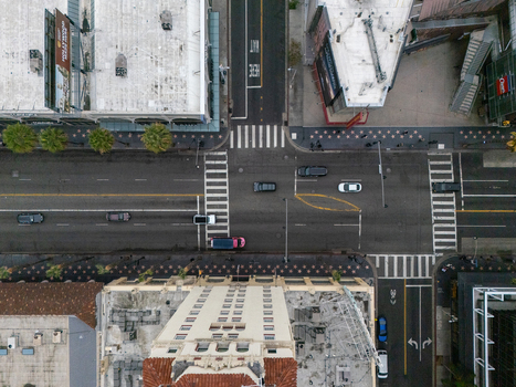 Aerial view of the Hollywood Walk of Fame intersection featuring star studded sidewalks busy traffic and historic architecture Los Angeles California United States.