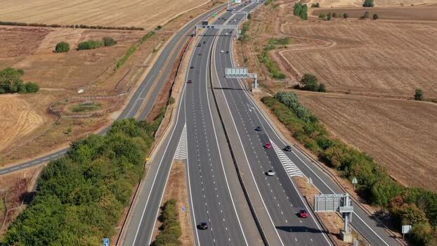 Aerial view of A1 motorway traffic flow in Huntingdon United Kingdom. Aerial view of A1 motorway traffic flow in Huntingdon United Kingdom.
