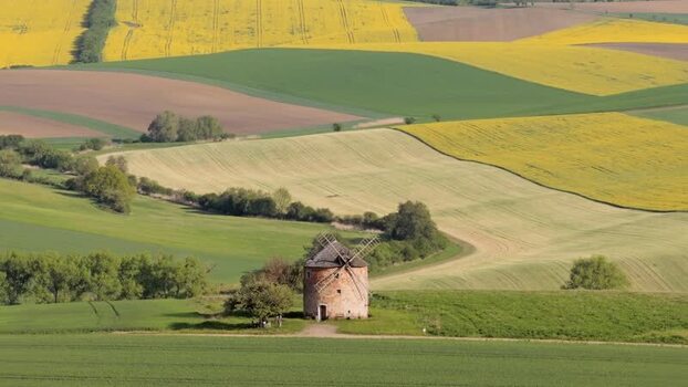 Aerial view of Kunkovice Windmill and rolling hills Czechia. Aerial view of Kunkovice Windmill and rolling hills Czechia.