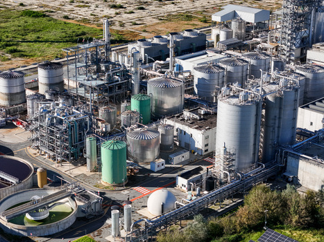 Aerial view of the Impianto chimico chemical plant featuring industrial storage tanks complex piping systems and processing units in Crescentino Piedmont Italy.