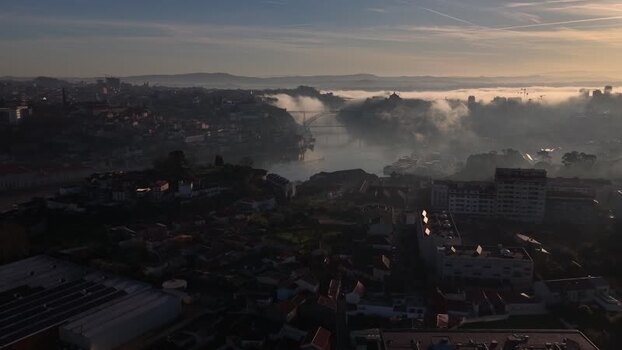 Aerial view during sunrise of Dom Lu&iacute;s I Bridge in Porto city Portugal.