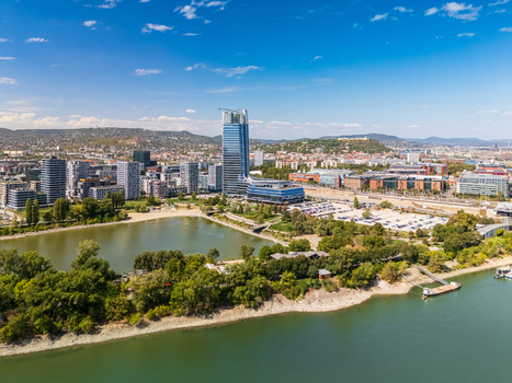 Aerial view of Mol Campus and Budapest skyline on the Danube in summer. Aerial view of Mol Campus and Budapest skyline on the Danube in summer.