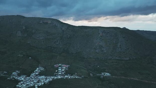 Aerial view of El Tarajal village and rocky mountains Spain.