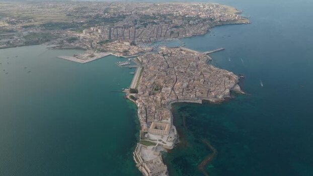 Aerial view of the Island of Ortigia and historic Syracuse Italy. Aerial view of the Island of Ortigia and historic Syracuse Italy.