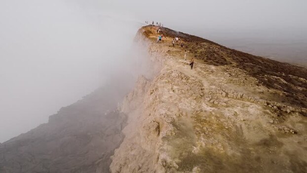 Aerial view of Erta Ale Volcano with people on the crater rim Ethiopia. Aerial view of Erta Ale Volcano with people on the crater rim Ethiopia.