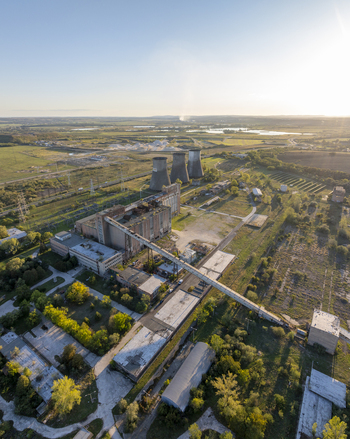 Aerial view of the abandoned Inota Power Plant with its iconic cooling towers industrial structures and surrounding landscape in Varpalota Hungary. Aerial view of the abandoned Inota Power Plant with its iconic cooling towers industrial structures and surrounding landscape in Varpalota Hungary.