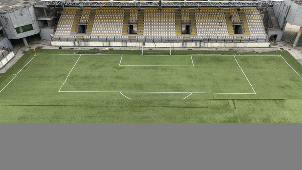 Aerial view of Lagos Island stadium featuring a green artificial turf football pitch and tiered seating in Lagos Lagos Nigeria. Aerial view of Lagos Island stadium featuring a green artificial turf football pitch and tiered seating in Lagos Lagos Nigeria.