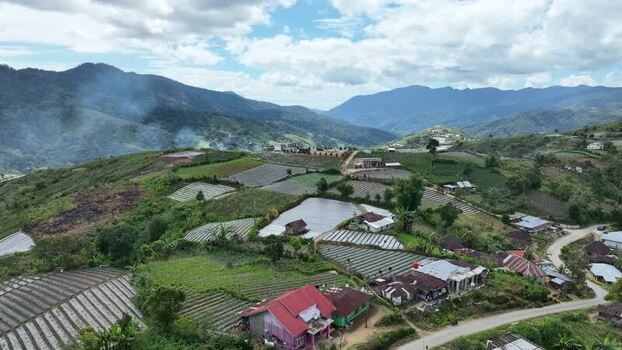 Aerial view of Alahan Panjang village and terraced farms Indonesia. Aerial view of Alahan Panjang village and terraced farms Indonesia.