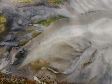 Aerial view of Abstract Tidal Patterns Culbin Sands with intricate sand ripples water channels and wet sediment textures in Nairn Scotland United Kingdom. Aerial view of Abstract Tidal Patterns Culbin Sands with intricate sand ripples water channels and wet sediment textures in Nairn Scotland United Kingdom.