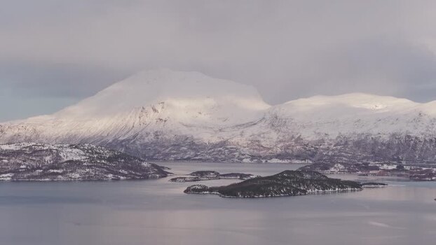 Aerial view of snow capped mountains and islands Norway.