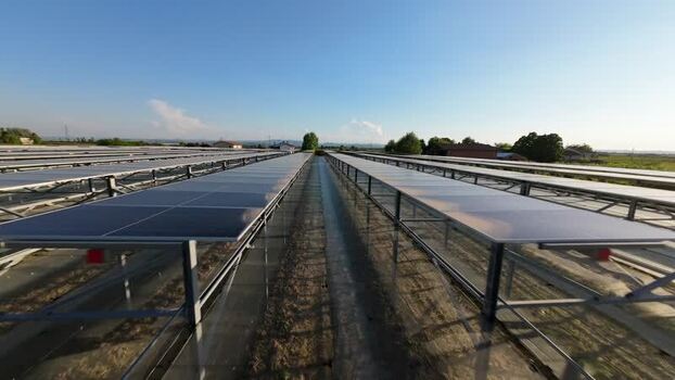 Aerial view of solar panels in a field in Italy.