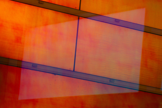 View of geometric abstraction featuring orange and red hues overlaid with a translucent rectangular form creating depth and visual intrigue La Defense Flevoland Netherlands. View of geometric abstraction featuring orange and red hues overlaid with a translucent rectangular form creating depth and visual intrigue La Defense Flevoland Netherlands.