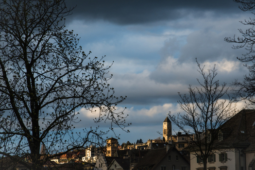 Zurich Switzerland 02 April 2023 View of the city skyline where the Grossmünster cathedral stands tall against a backdrop of dramatic cloud strewn skies. Zurich Switzerland 02 April 2023 View of the city skyline where the Grossmünster cathedral stands tall against a backdrop of dramatic cloud strewn skies.
