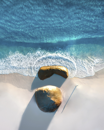 Aerial view of stones along the shoreline at Little Beach Nanarup Two Peoples Bay Nature reserve Western Australia Australia.