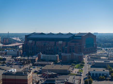 Indianapolis United States 27 September 2026 Aerial view of Lucas Oil Stadium with its brick facade and retractable roof surrounded by urban infrastructure and city buildings. Indianapolis United States 27 September 2026 Aerial view of Lucas Oil Stadium with its brick facade and retractable roof surrounded by urban infrastructure and city buildings.
