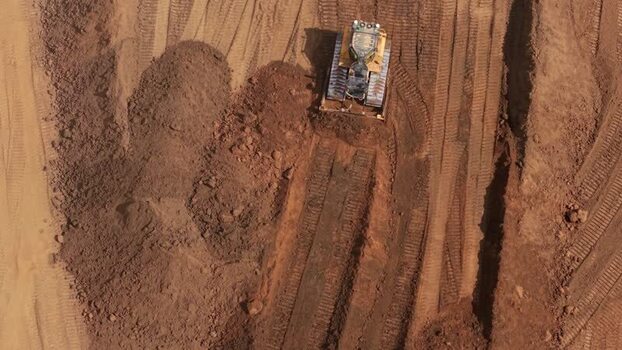 Aerial view of bulldozer at Black Cat Roundabout United Kingdom.