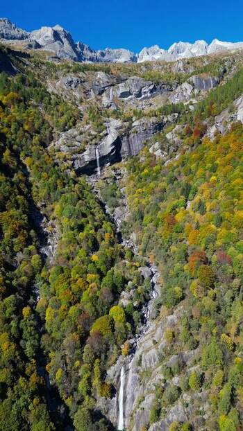 Aerial view of Val di Mello waterfall and autumn forest Italy. Aerial view of Val di Mello waterfall and autumn forest Italy.