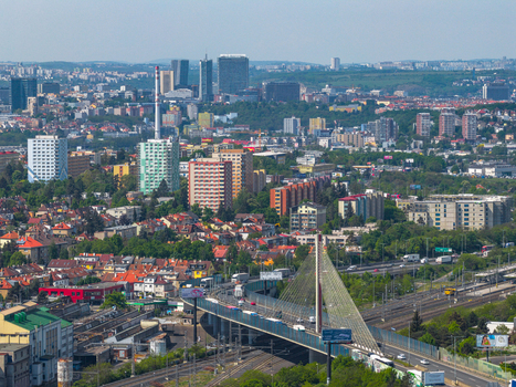 Aerial view of the cityscape of Prague featuring the Nusle Bridge surrounding residential buildings railway tracks and urban infrastructure in Prague Prague Czechia.