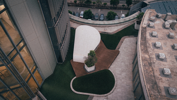 Accra Ghana 25 July 2024 Aerial view of Ecobank Ghana Plc head office featuring modern architectural curves landscaped green areas and paved walkways. Accra Ghana 25 July 2024 Aerial view of Ecobank Ghana Plc head office featuring modern architectural curves landscaped green areas and paved walkways.