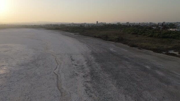 Aerial view of Larnaca Salt Lake at sunset Cyprus.