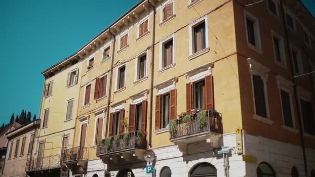 View of historic building facades with shutters in Verona Italy. View of historic building facades with shutters in Verona Italy.