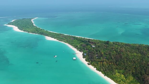 Aerial view of Vaikaradhoo island in turquoise waters Maldives. Aerial view of Vaikaradhoo island in turquoise waters Maldives.