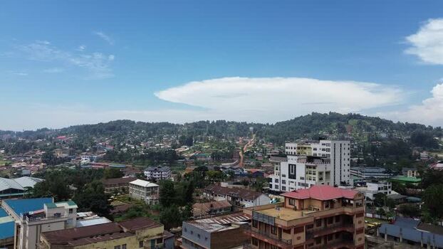 Aerial view of Kisii town with green hills and urban buildings Kenya. Aerial view of Kisii town with green hills and urban buildings Kenya.