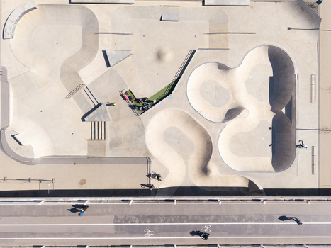Aerial view of Chiune Sugihara Sakura Park skatepark with concrete bowls ramps and smooth surfaces in Vilnius Vilniaus apskritis Lithuania. Aerial view of Chiune Sugihara Sakura Park skatepark with concrete bowls ramps and smooth surfaces in Vilnius Vilniaus apskritis Lithuania.