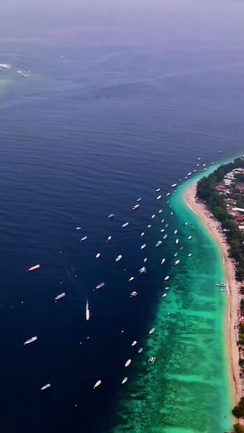 Aerial view of boats along the coast of Bali Indonesia.