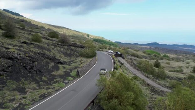 Aerial view of a winding road on Mount Etna Italy. Aerial view of a winding road on Mount Etna Italy.