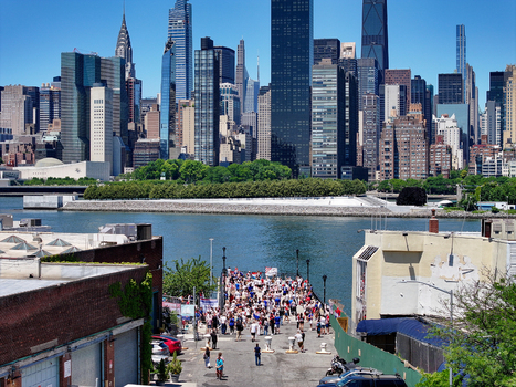 Long Island City United States 13 June 2026 Aerial view of a crowd of Croatia fans gathered on a pier overlooking the East River with the Manhattan skyline in the background.