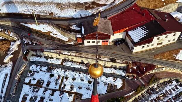Aerial view of Nauders church and cemetery in Tyrol Austria.