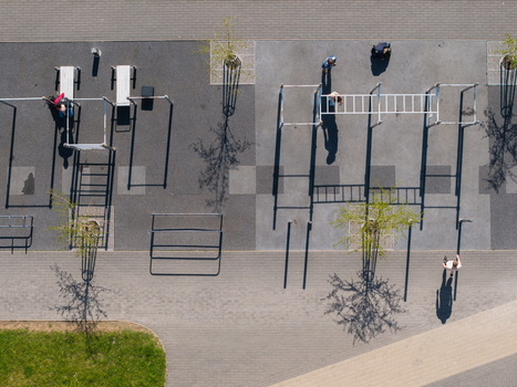 Vilnius Lithuania 20 April 2026 Aerial view of Chiune Sugihara Sakura Park featuring an outdoor fitness area with people exercising and walking on paved paths. Vilnius Lithuania 20 April 2026 Aerial view of Chiune Sugihara Sakura Park featuring an outdoor fitness area with people exercising and walking on paved paths.