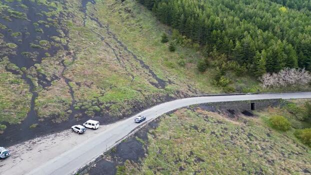 Aerial view of a road on the slopes of Mount Etna Italy. Aerial view of a road on the slopes of Mount Etna Italy.