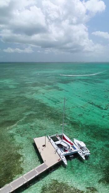 Aerial view of catamaran at Grand Cayman pier Cayman Islands. Aerial view of catamaran at Grand Cayman pier Cayman Islands.