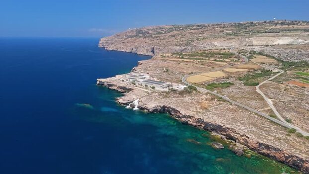 Aerial view of Ghar Lapsi desalination plant on Malta s rocky coastline Aerial view of Ghar Lapsi desalination plant on Malta s rocky coastline
