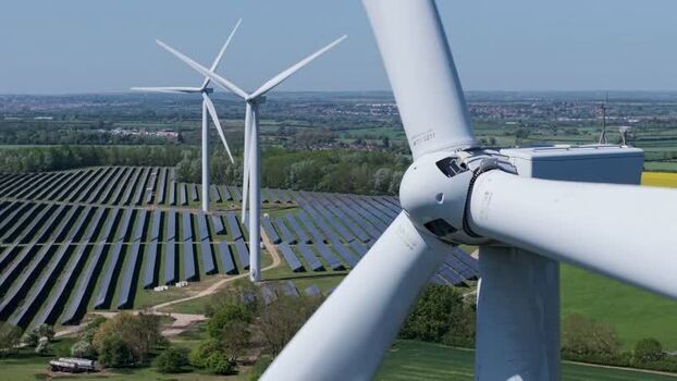 Aerial view of Chelveston Wind Farm and solar panels United Kingdom. Aerial view of Chelveston Wind Farm and solar panels United Kingdom.